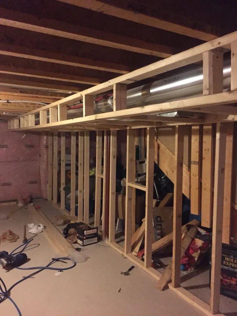 Basement framing with a bulkhead around the ductwork, The Glebe, Ottawa